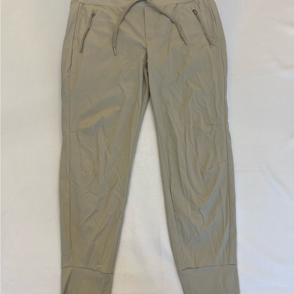 Women’s Athleta Tan Track Pants with Tapered Legs